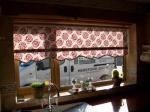 Roller blind with scallop