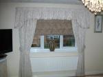 Pelmet board with shaped valance